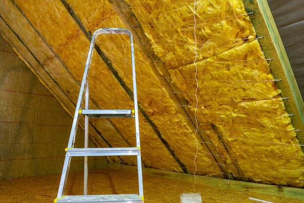 The attic of a Hartford, CT house is insulated with fibrewool.