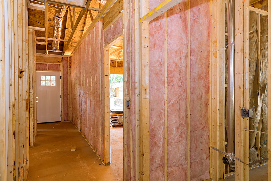 Fibreglass insulation is installed in the home walls in Hartford, CT.